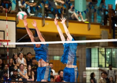 Two University of Auckland students playing Tertiary Volleyball