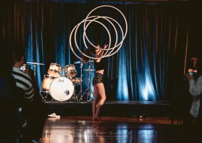 A student performing with hula hoops