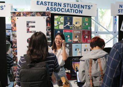 Students talking at Eastern Students Association stall
