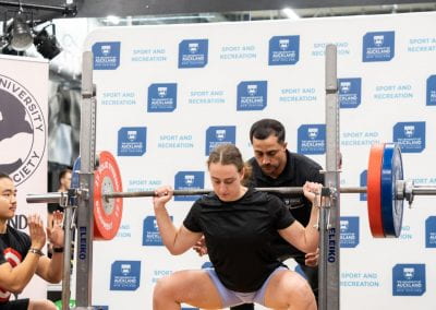 University of Auckland female weightlifter squatting 110kgs