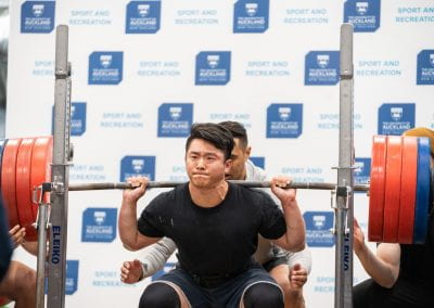 University of Auckland male weightlifter squatting 210kgs