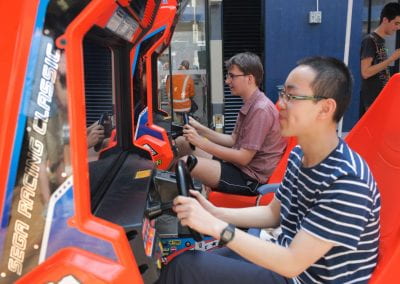 Students playing arcade games